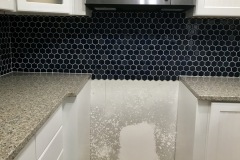 Geometric-Tile-Installation-Behind-Stove