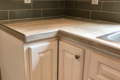 grey-subway-tile-backsplash-around-outlets