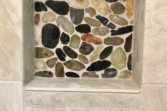 Decorative-Stone-Backing-in-Shower-Niche