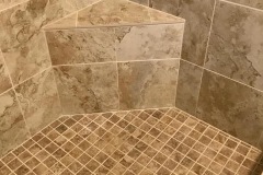 place-to-sit-or-store-shampoo-bottles-in-shower