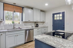 05-complete-kitchen-remodel-straight-herringbone-Pattern-Tile-Backsplash-new-cabinets-tile-floor-