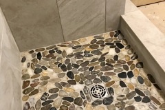 Shower-Drain-in-Stone-Tile-Floor
