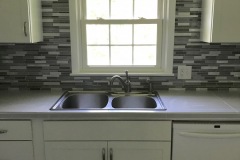 full-height-backsplash-around-kitchen-window